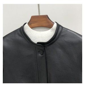 Women's short sheepskin coat with genuine leather